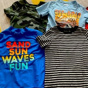 Lot of 4. Cat & Jack and OKBG boys t-shirts (3), and (1) rash guard. Size 4T.